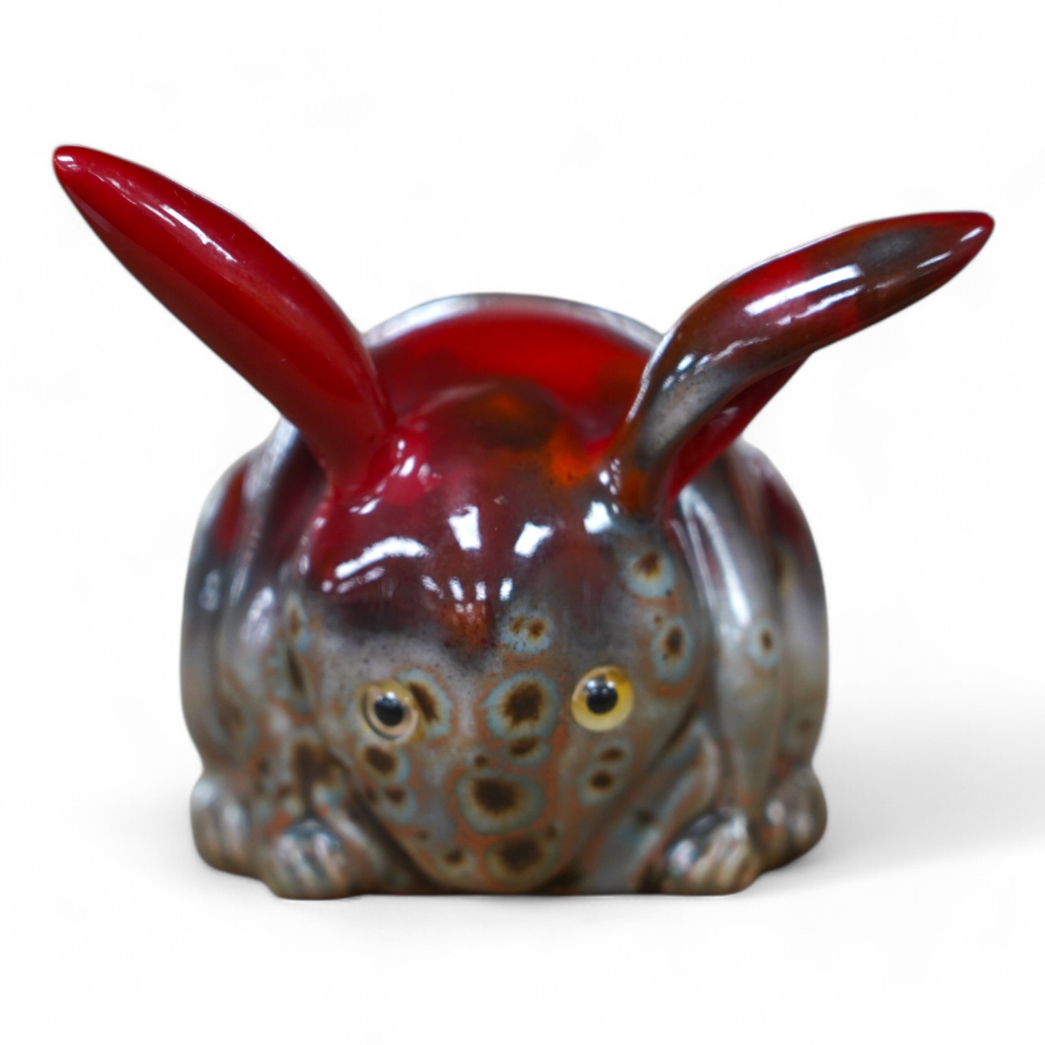 A Bernard Moore grey crystalline glaze rabbit, c.1910, with yellow glass inset eyes, 6cm high. Condition - good